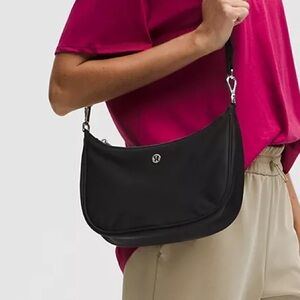 lululemon athletica Black Crossbody Bag with Purple and Pink Accents